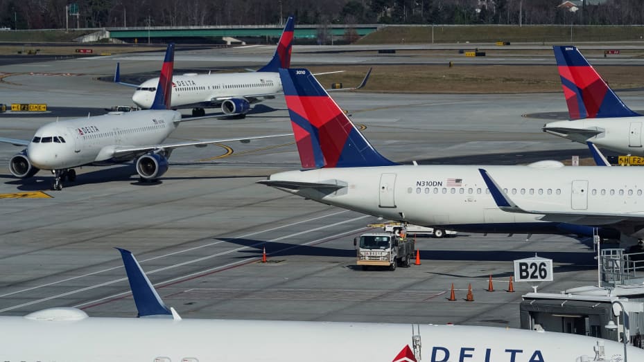 Delta Air Lines jets are seen on a taxiway at Hartsfield-Jackson Atlanta International Airport in Atlanta, Georgia, U.S. December 22, 2021.