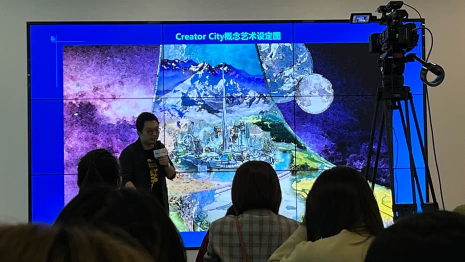 Ma Jie, a vice president at Baidu, shares the company's metaverse plans at a media event in Beijing on Dec. 21, 2021.