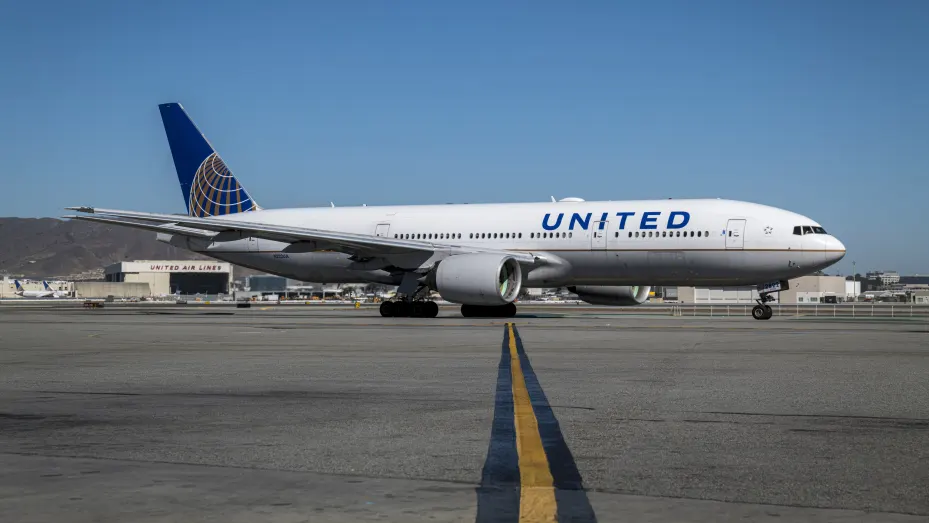 A United Airlines Holdings Inc. Boeing 777-200 aircraft on the tarmac at San Francisco International Airport (SFO) in San Francisco, California, U.S., on Thursday, Oct. 15, 2020.