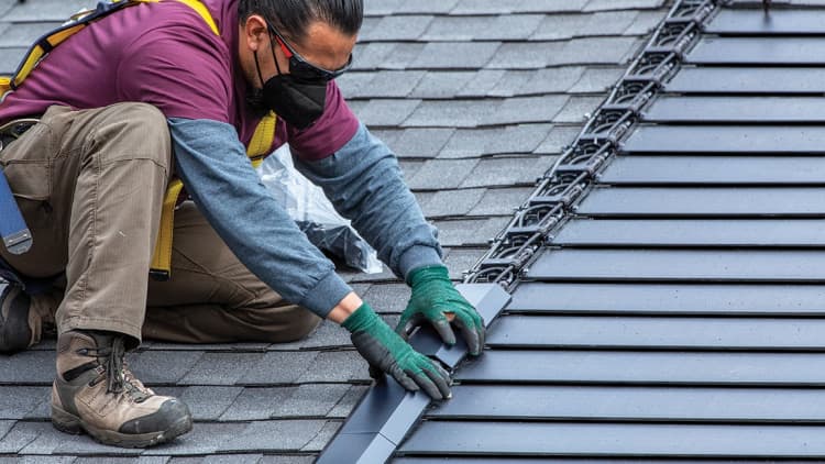 This roofing company says it's figured out how to make solar shingles affordable