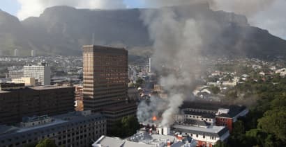 Firefighters battle blaze at South African parliament building in Cape Town