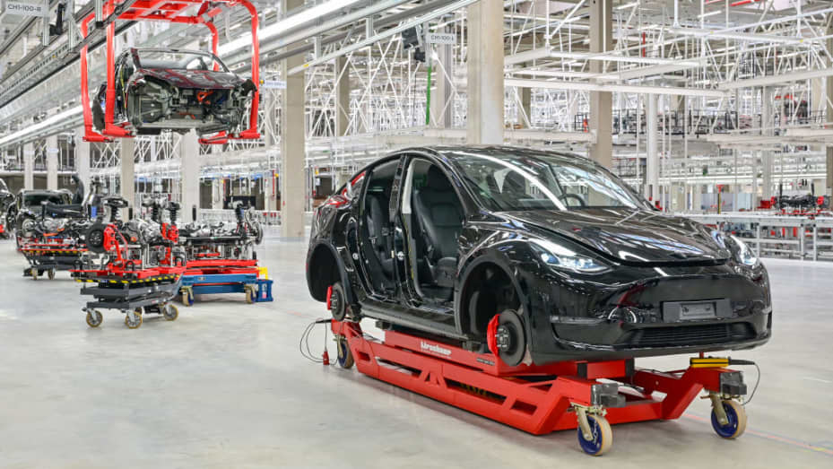 A Tesla Model Y is seen in a production hall of the Tesla Gigafactory during the open day. In Grünheide, east of Berlin, the first vehicles are to roll off the production line from the end of 2021.