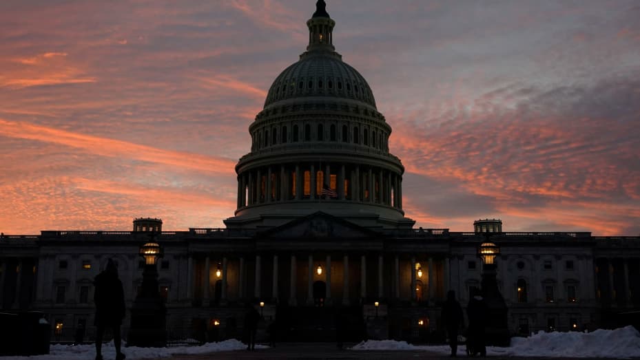 The U.S. Capitol is seen at sunset on the eve of the first anniversary of the January 6, 2021 attack on the building, on Capitol Hill in Washington, January 5, 2022.