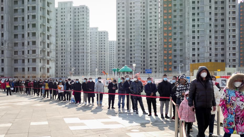 Residents line up for mass Covid-19 testing on Jan. 9, 2022, in Tianjin, after the municipality reported 20 news cases over the weekend.