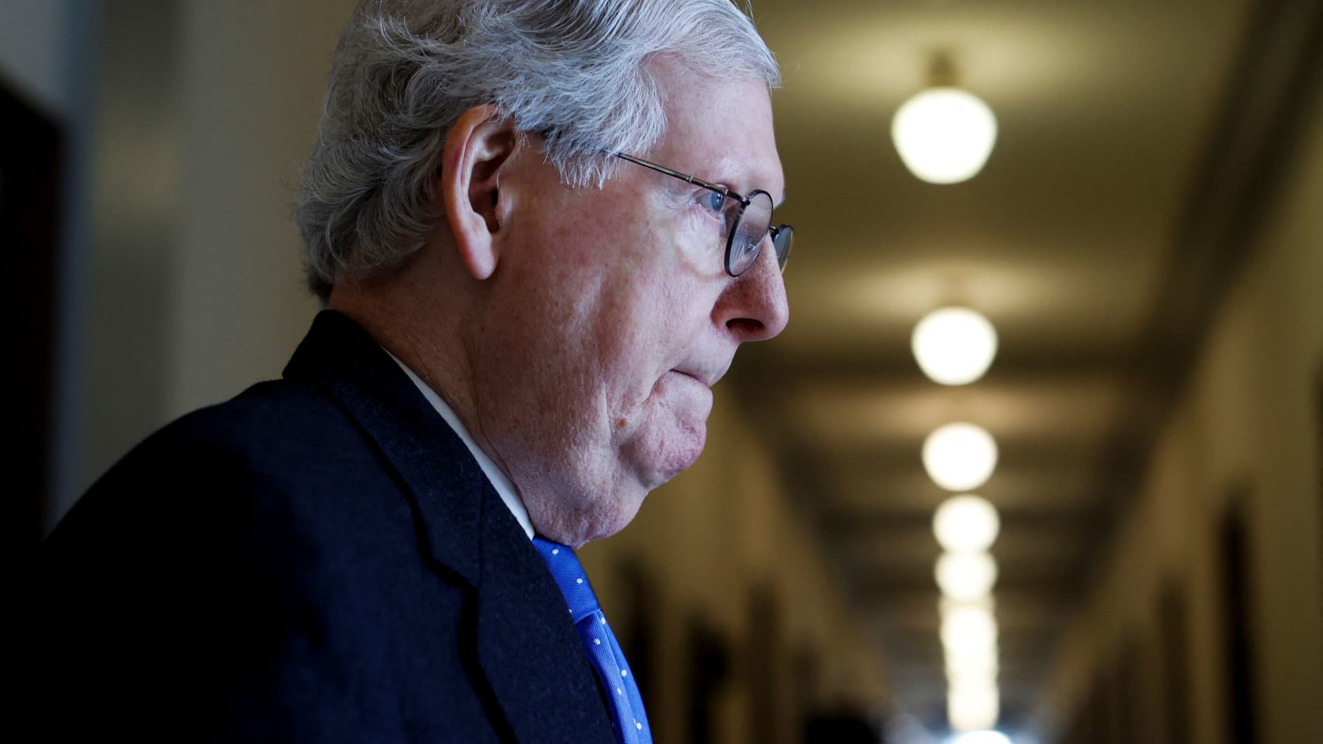 U.S. Senate Minority Leader Mitch McConnell (R-KY) departs after a Senate Republican caucus luncheon on Capitol Hill in Washington, January 12, 2022.