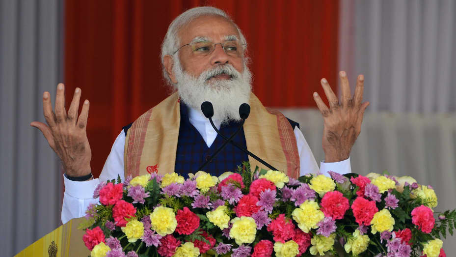 Indian Prime Minister Narendra Modi addresses a public meeting at Jerenga Pathar in Sivasagar district of India's Assam state on January 23, 2021.