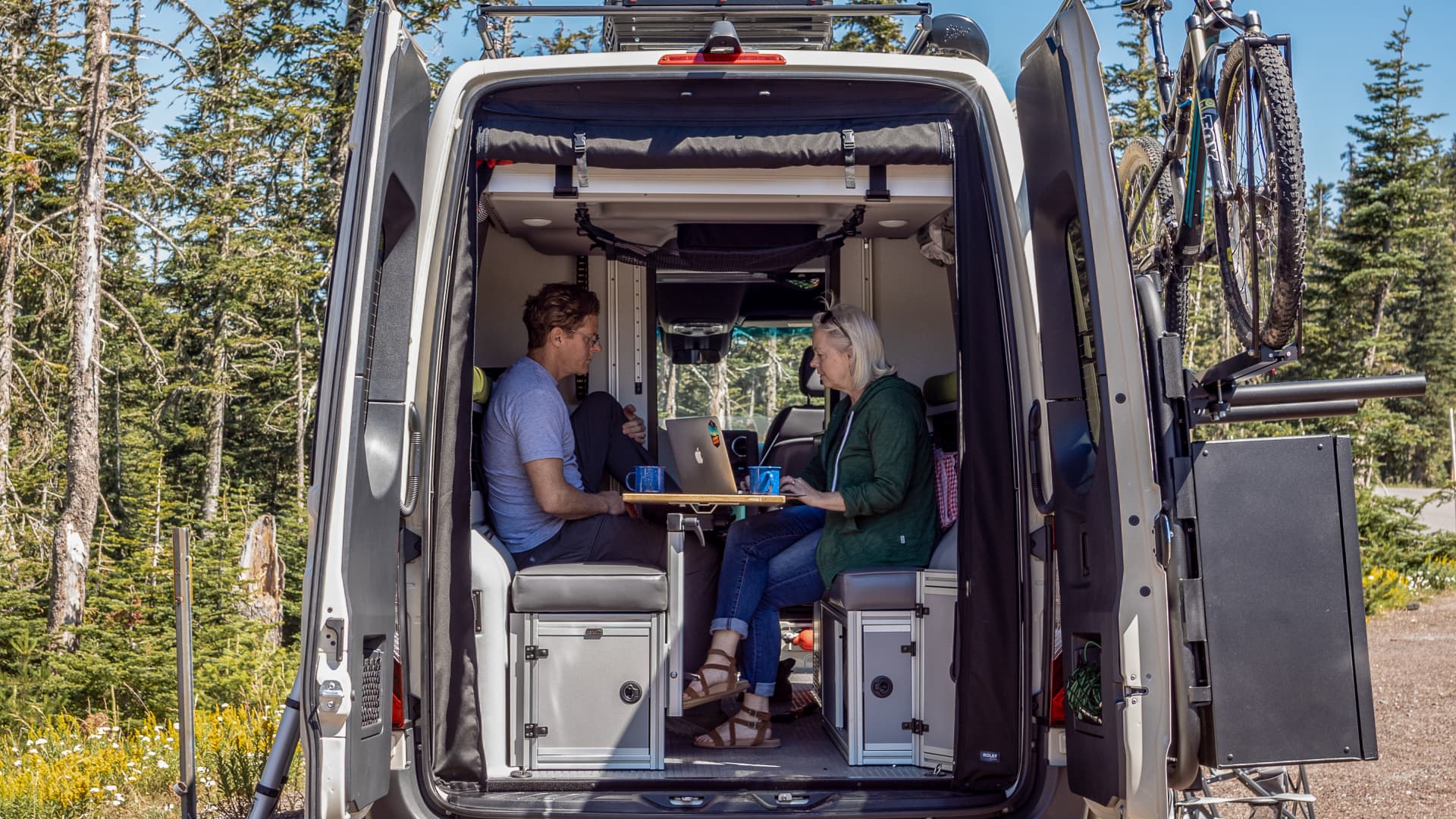 The Dyrt co-founders Kevin Long and Sarah Smith work out of their camper van while traveling around the country.