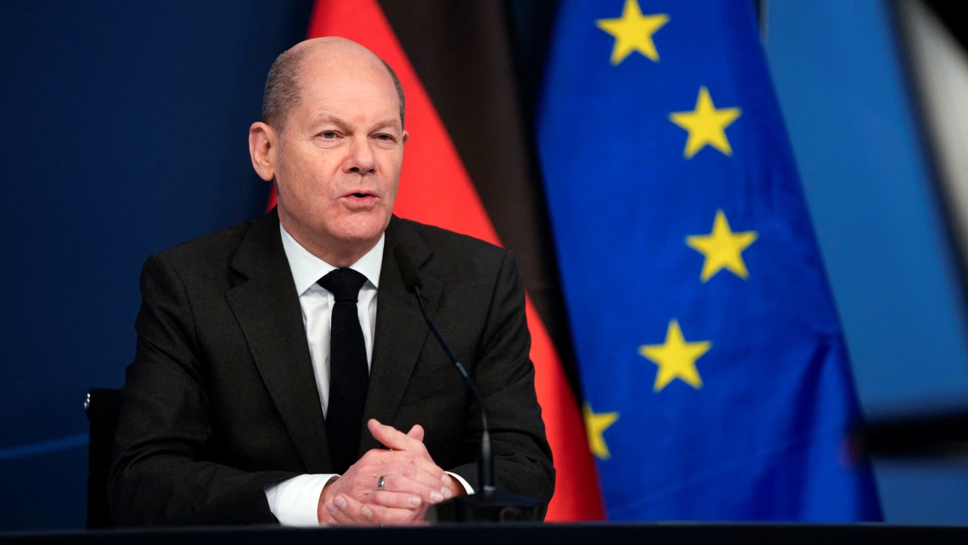 German Chancellor Olaf Scholz sits in front of a camera as he delivers his speech for the Davos Agenda 2022, at the Chancellery in Berlin, Germany January 19, 2022.