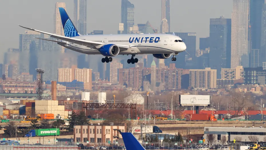 A passenger airplane is landing on Newark Liberty International Airport in Newark, New Jersey, on January 19, 2022.