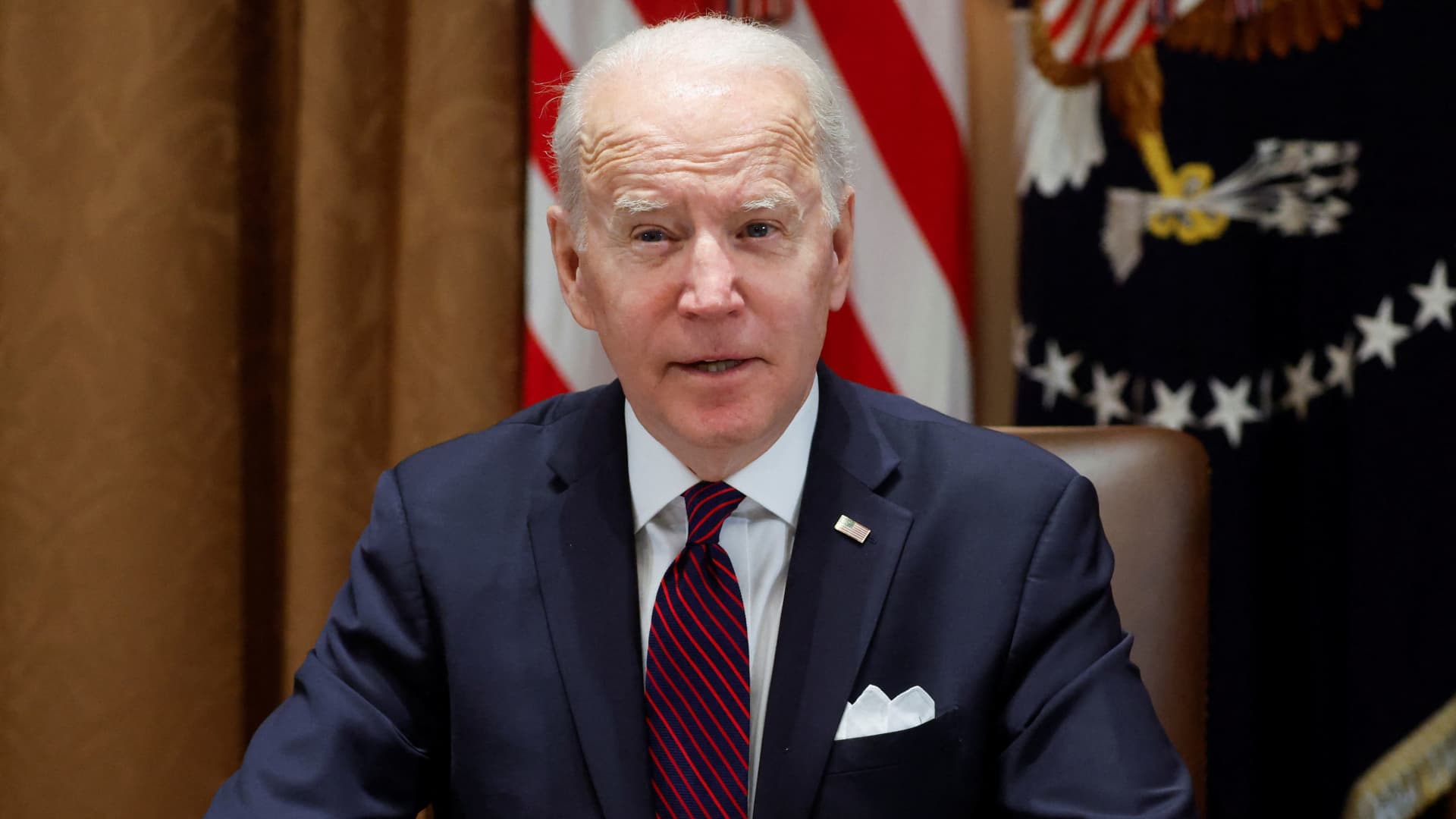 U.S. President Joe Biden speaks to reporters on the situation in Ukraine before a meeting with his Infrastructure Implementation Task Force, in the Cabinet Room at the White House, in Washington, U.S., January 20, 2022.