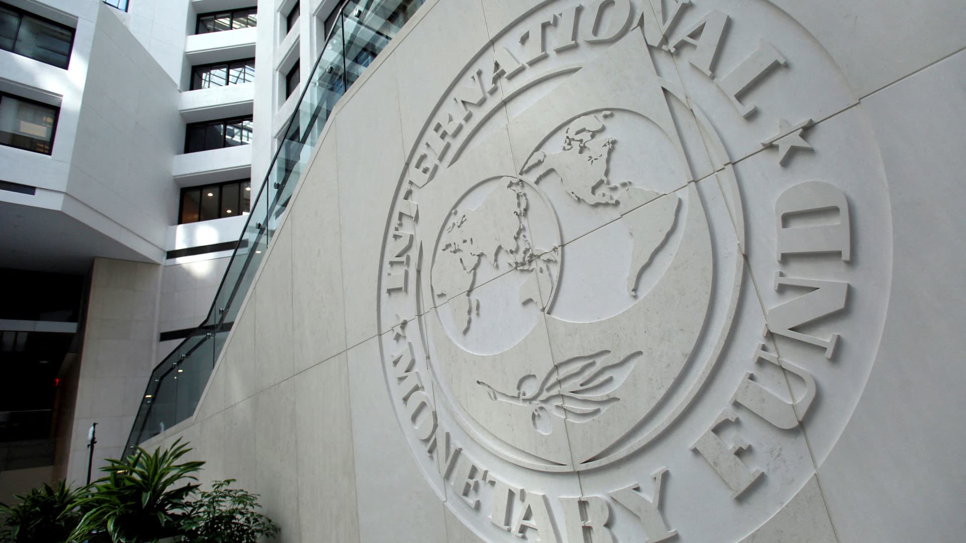 The International Monetary Fund logo is seen inside its headquarters at the end of the IMF/World Bank annual meetings in Washington.
