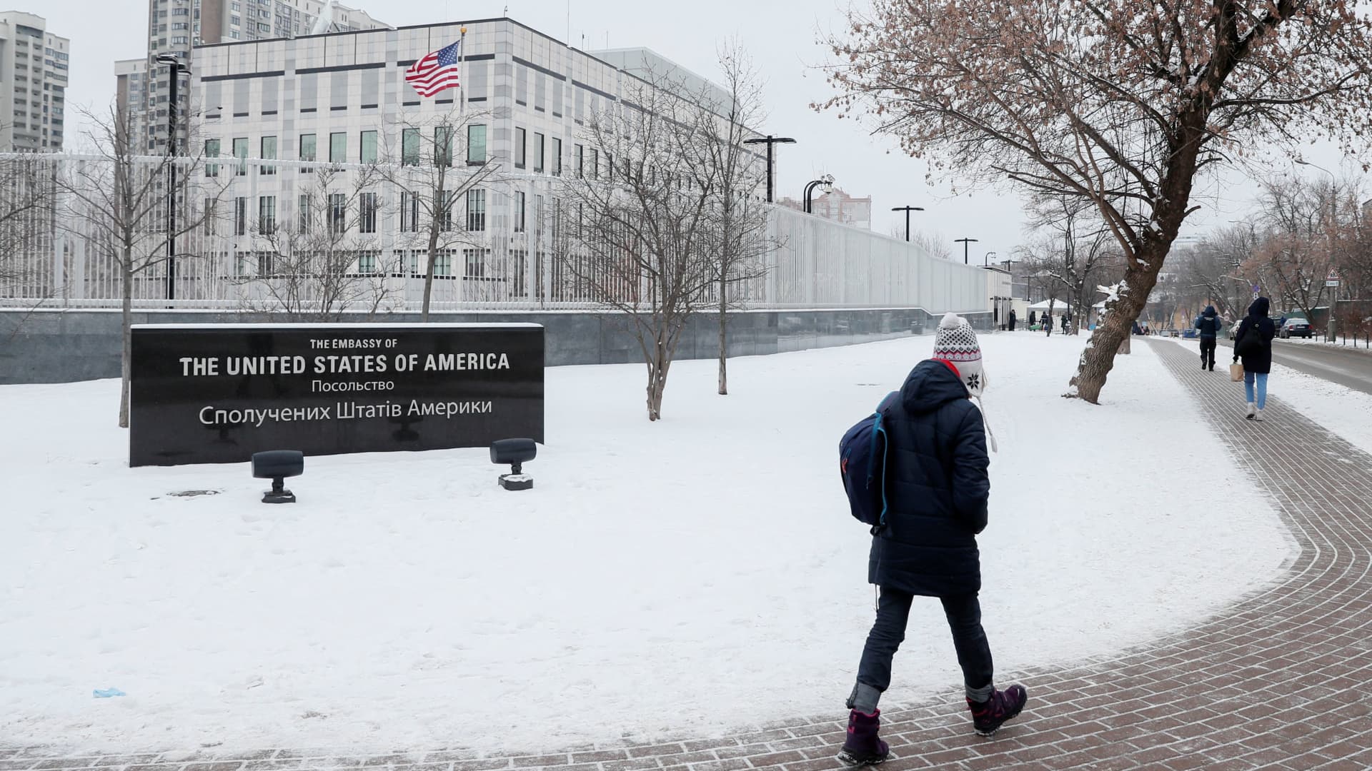 People walk near the U.S. embassy in Kyiv, Ukraine January 24, 2022.