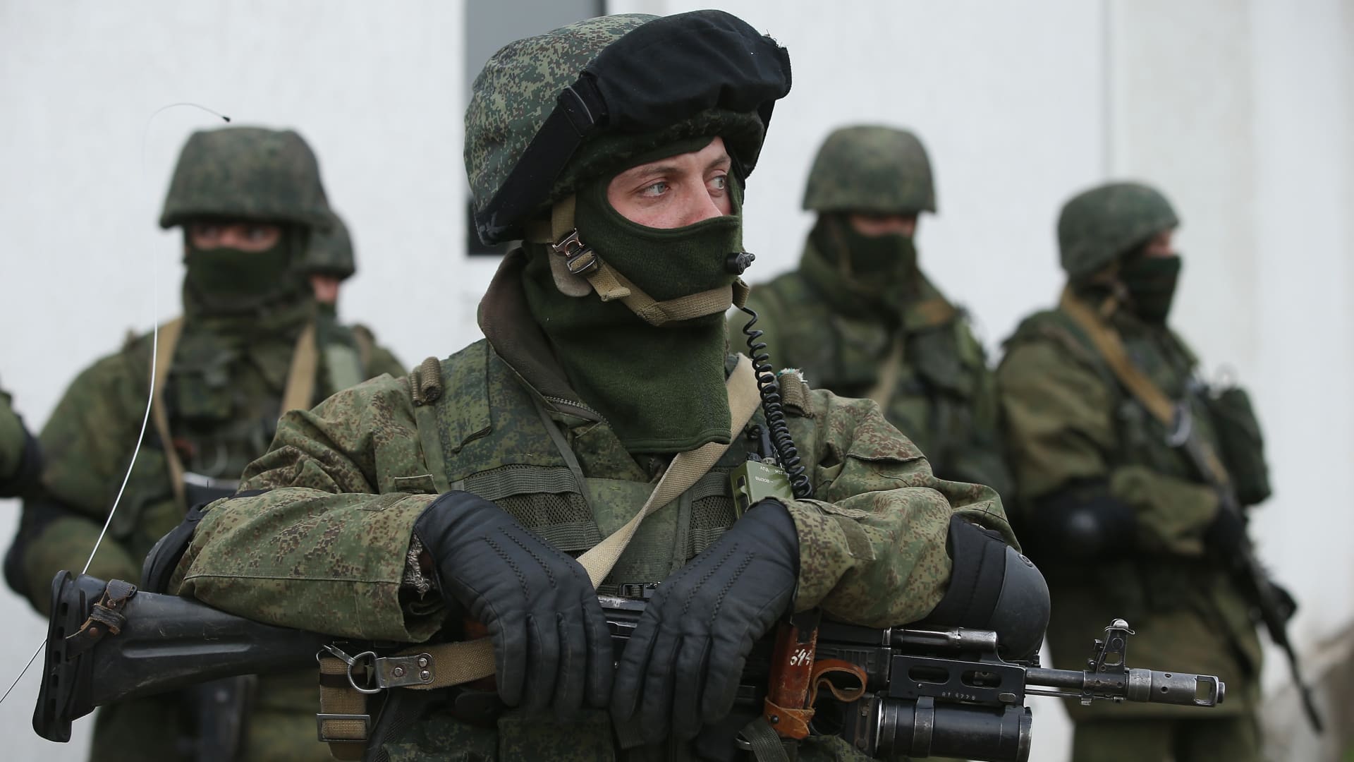 Soldiers who were among several hundred that took up positions around a Ukrainian military base stand near the base's periphery in Crimea on March 2, 2014 in Perevalne, Ukraine.