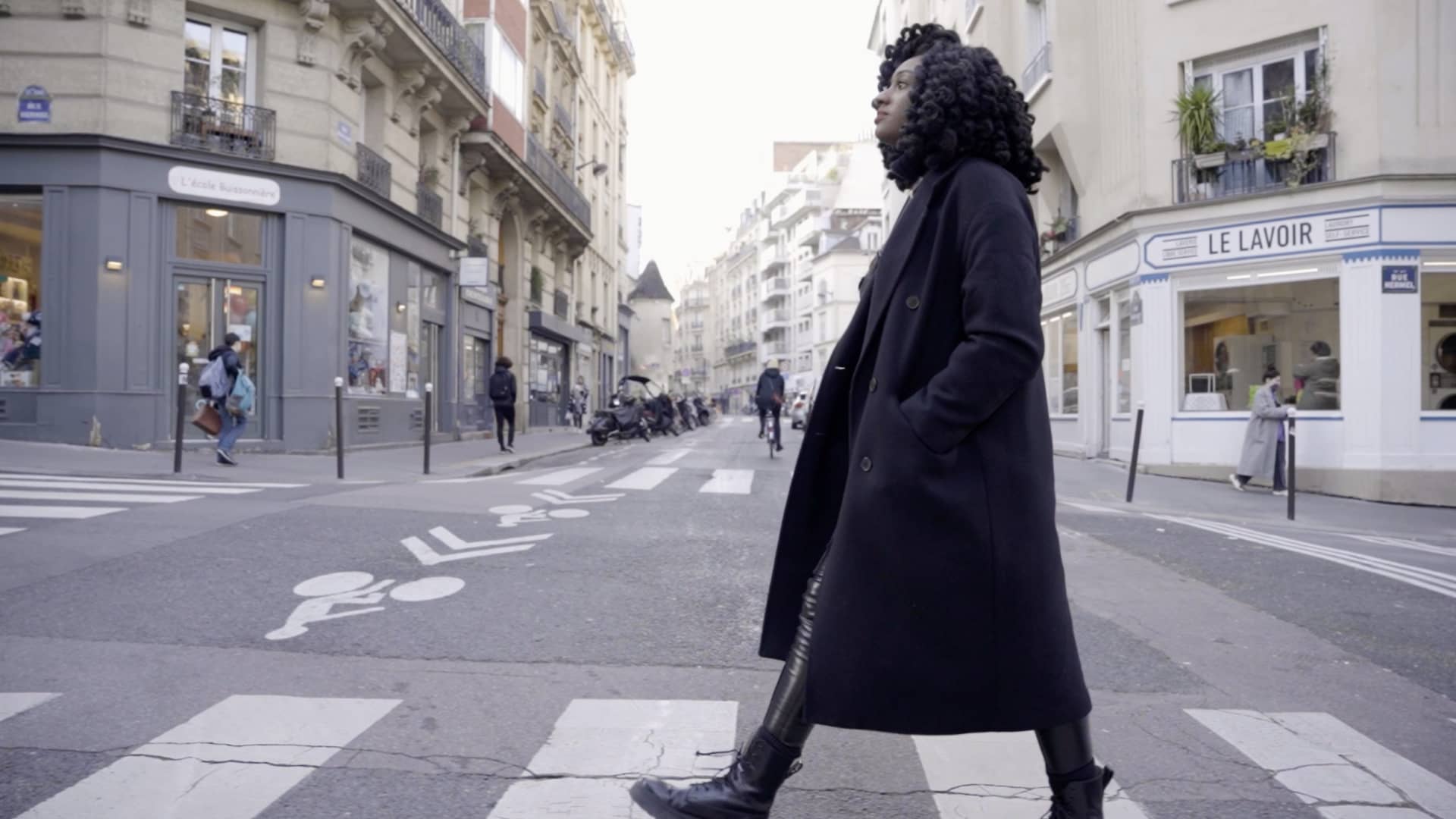 Davis takes a stroll in her neighborhood, which is in Paris' 18th arrondissement.