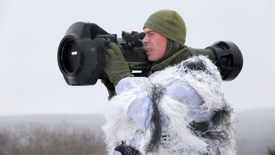 A Ukrainian Military Forces serviceman aims with a Next generation Light Anti-tank Weapon (NLAW) Swedish-British anti-aircraft missile launcher during a drill at the firing ground of the International Center for Peacekeeping and Security, near the western