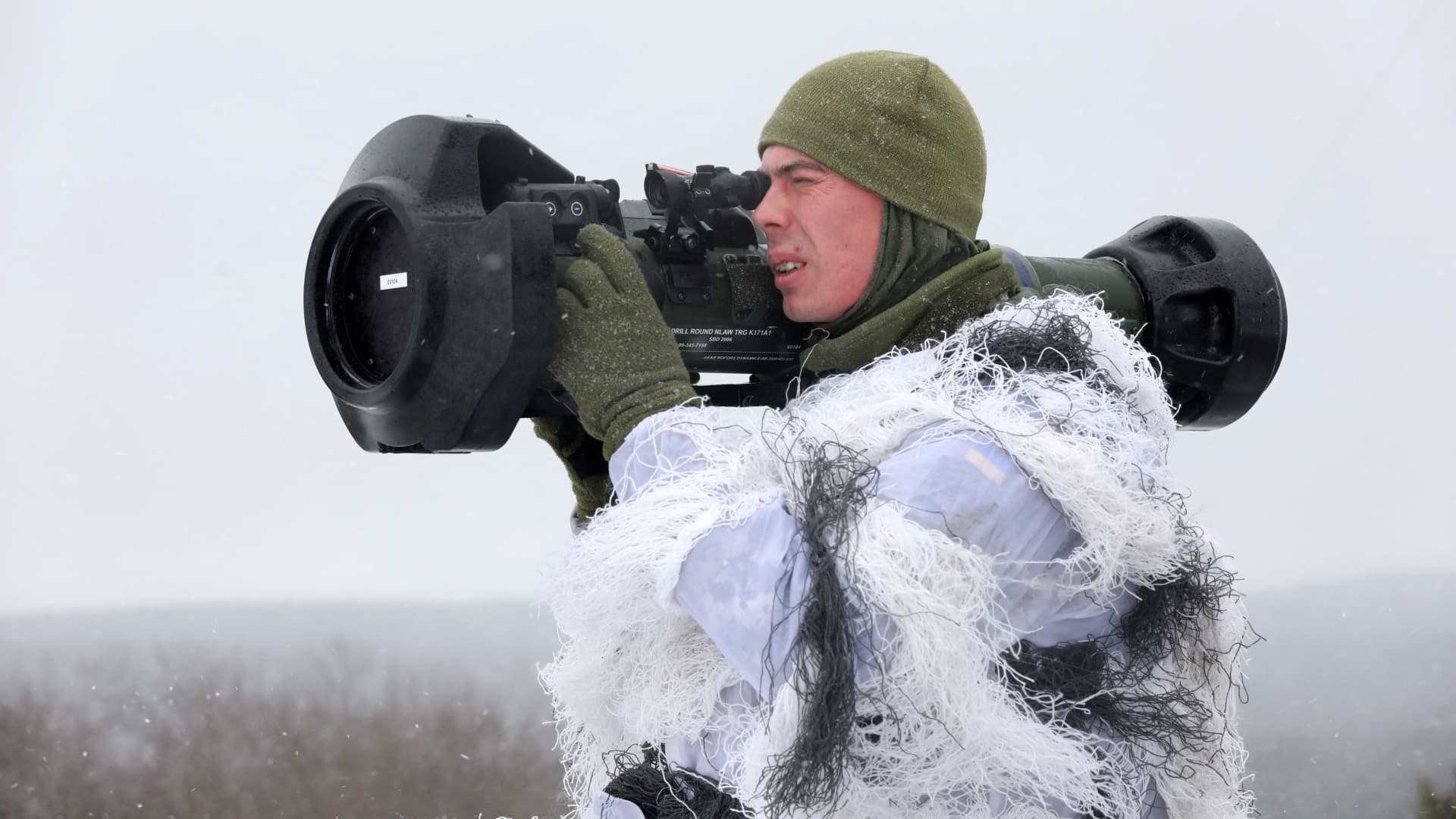 A Ukrainian Military Forces serviceman aims with a Next generation Light Anti-tank Weapon (NLAW) Swedish-British anti-aircraft missile launcher during a drill at the firing ground of the International Center for Peacekeeping and Security, near the western Ukrainian city of Lviv on January 28, 2022.