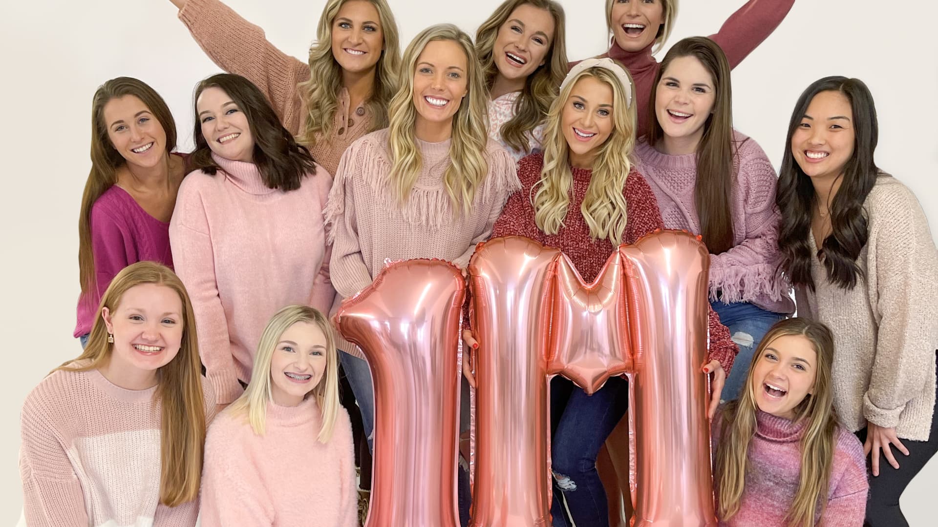 The Pink Lily team celebrating one million Instagram followers.