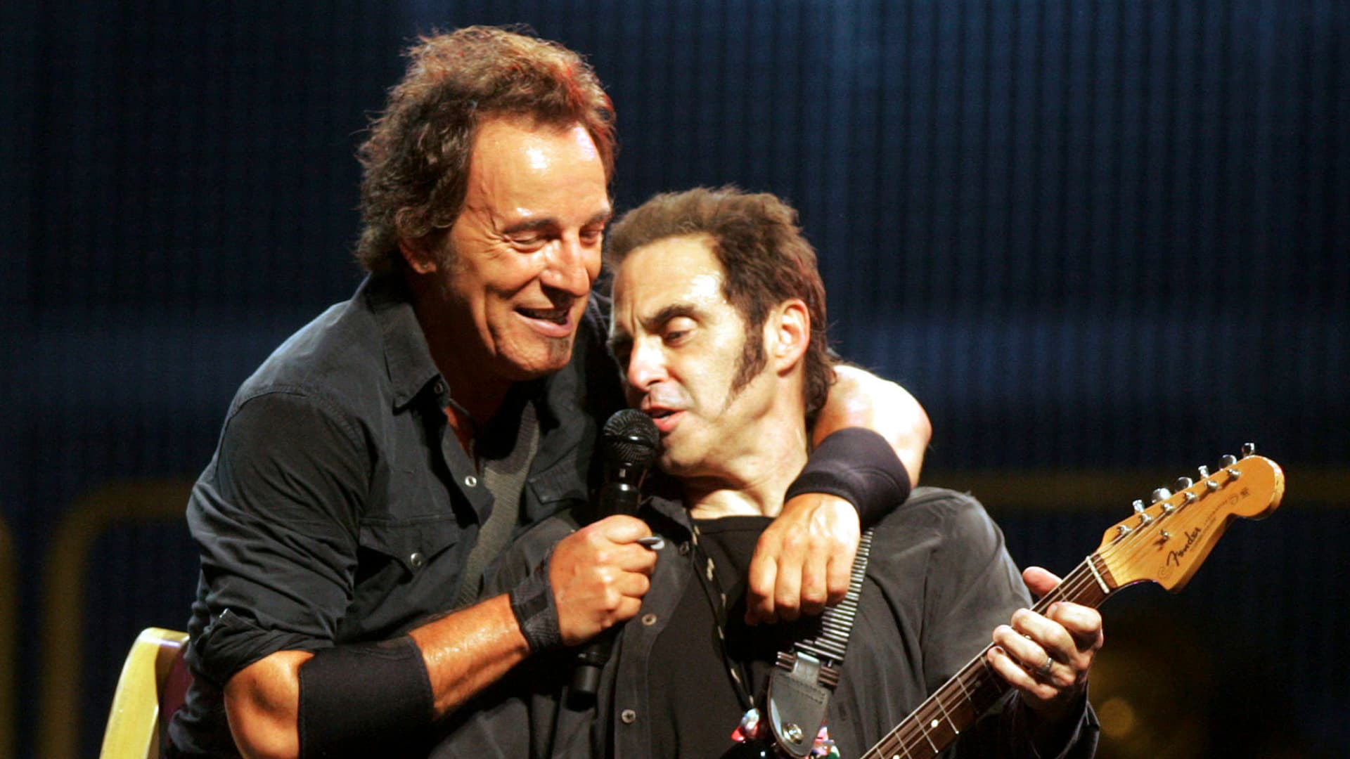 Bruce Springsteen (L) and Nils Lofgren with the E Street Band perform at Veterans Park in celebration of the 105th anniversary of Harley-Davidson motorcycles in Milwaukee, Wisconsin August 30, 2008.