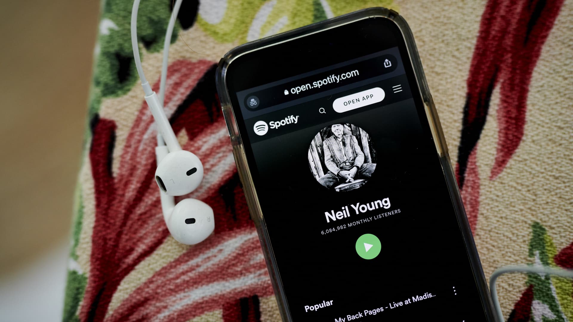 The Neil Young Spotify website page on a smartphone in Saint Thomas, U.S. Virgin Islands, on Sunday, January 30, 2022.