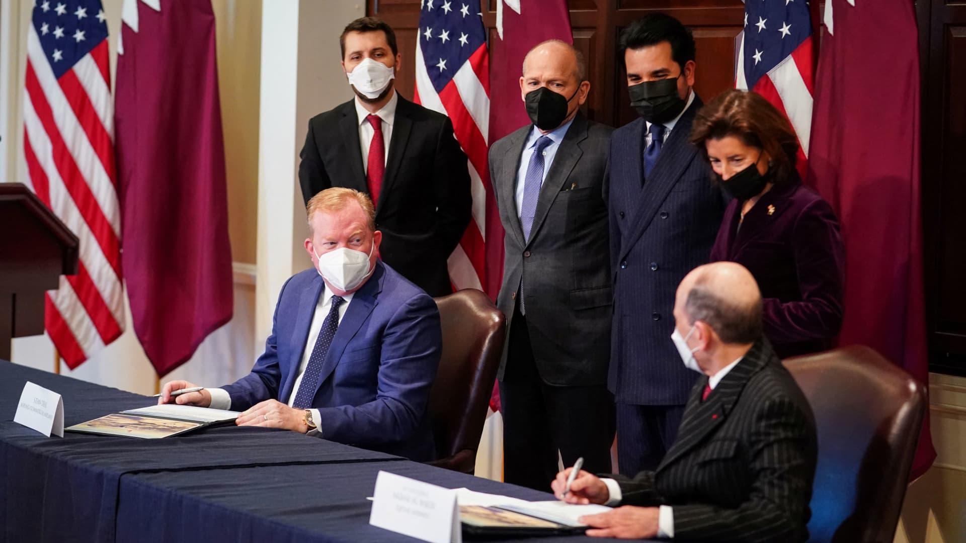 Boeing Commercial Airplanes President and CEO Stan Deal and Qatar Airlines CEO Akbar Al Baker participate in a signing ceremony of an agreement for the purchase of 777-8 Freighter planes at the Eisenhower Executive Office Building near the White House in Washington, January 31, 2022.