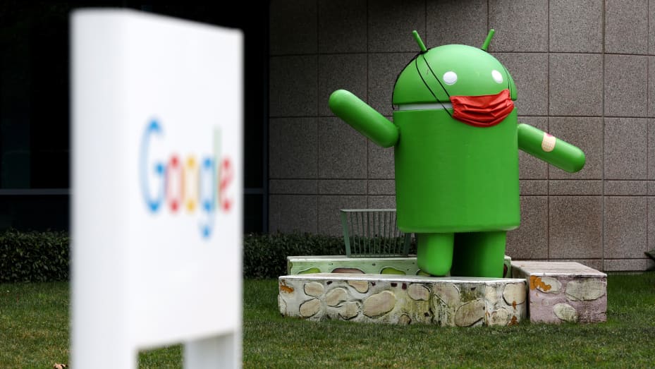 An Android statue is displayed in front of a building on the Google campus on January 31, 2022 in Mountain View, California. Google parent company Alphabet will report fourth quarter earnings on Tuesday after the closing bell.