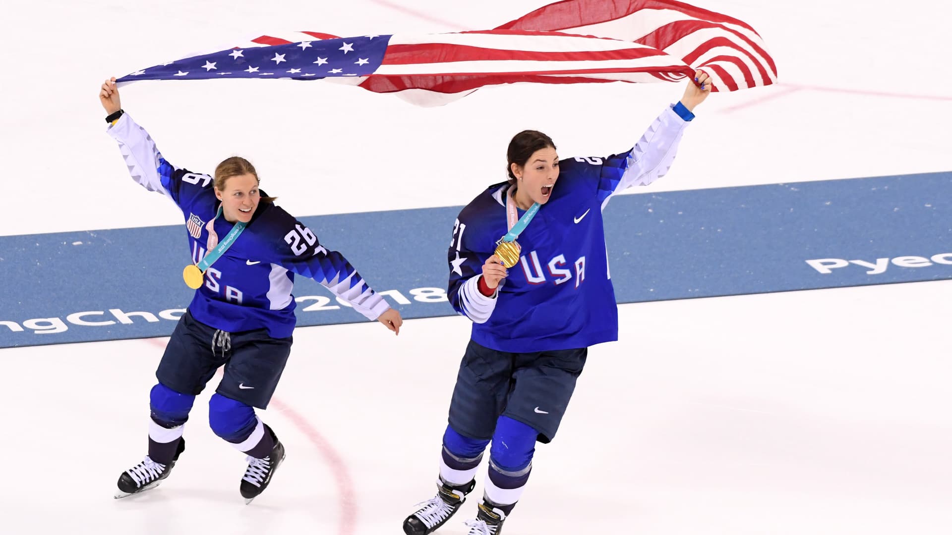 Gold medal winners Kendall Coyne #26 and Hilary Knight #21 of the United States celebrate after defeating Canada at the PyeongChang 2018 Winter Olympic Games.