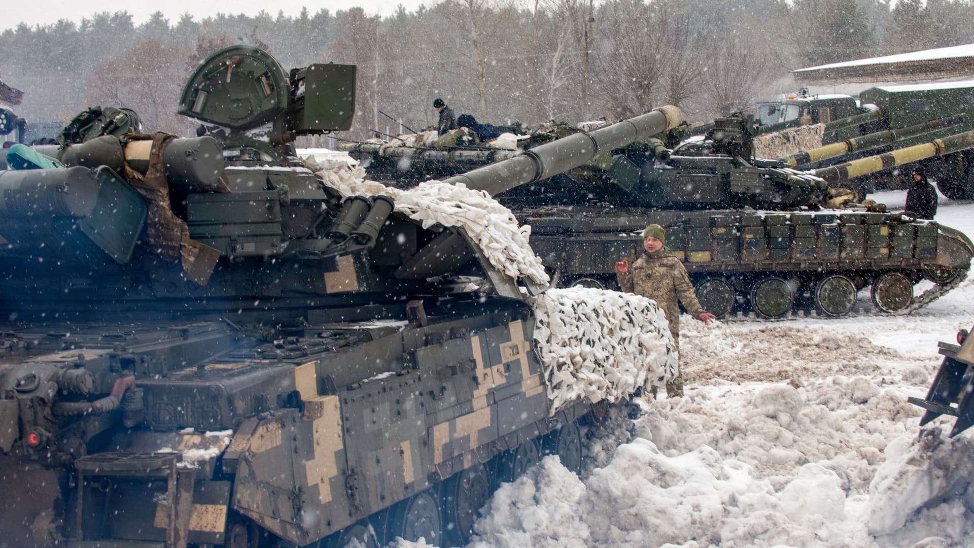 A photograph shows tanks of the 92nd separate mechanized brigade of Ukrainian Armed Forces parked in their base near Klugino-Bashkirivka village, in the Kharkiv region on January 31, 2022.