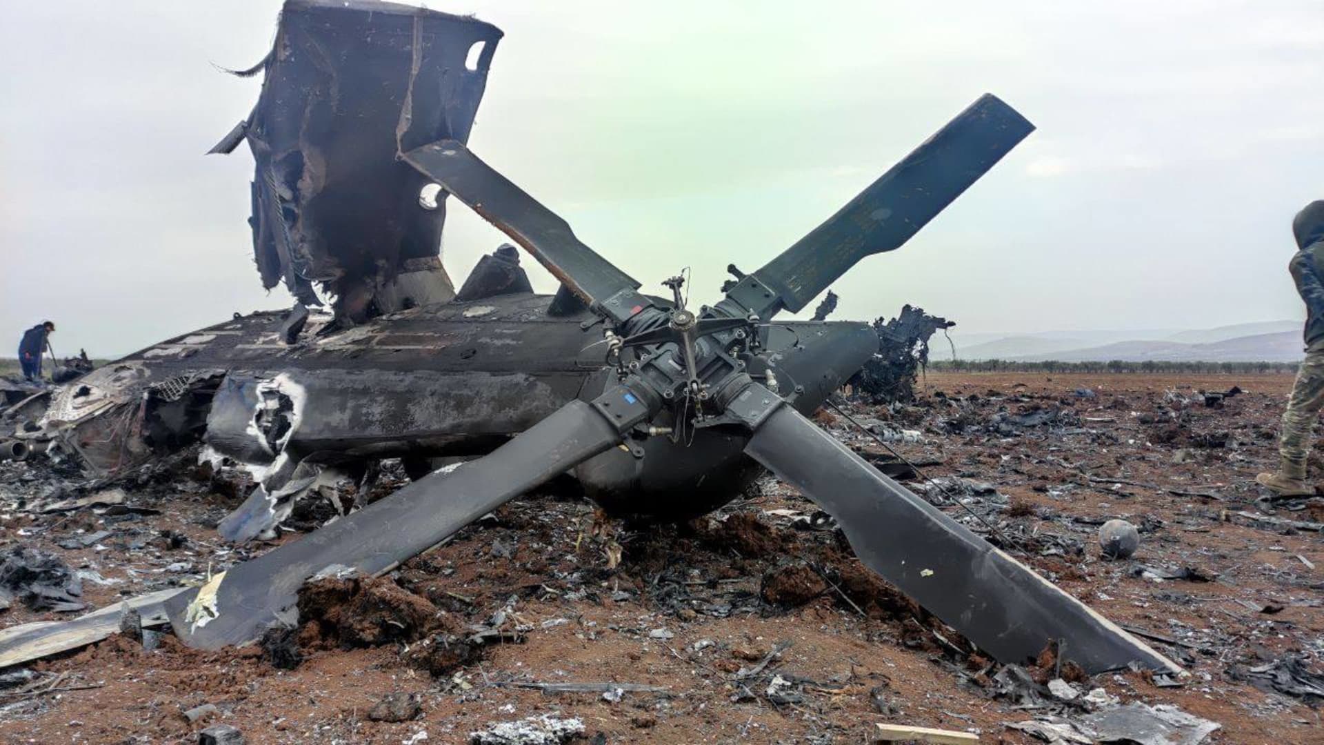 The wreckage of the military helicopter that US forces had to destroy due to technical malfunction during an operation carried out by US forces, is seen near Afrin's Jindires town on February 03, 2022 in Idlib, Syria.
