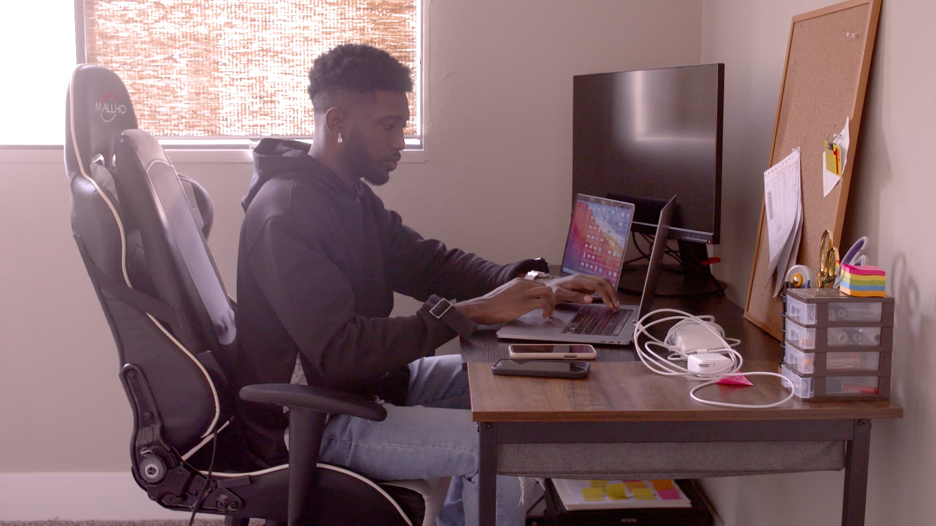 Terzel Ron working from home in Los Angeles. He is an associate producer for a large television network.