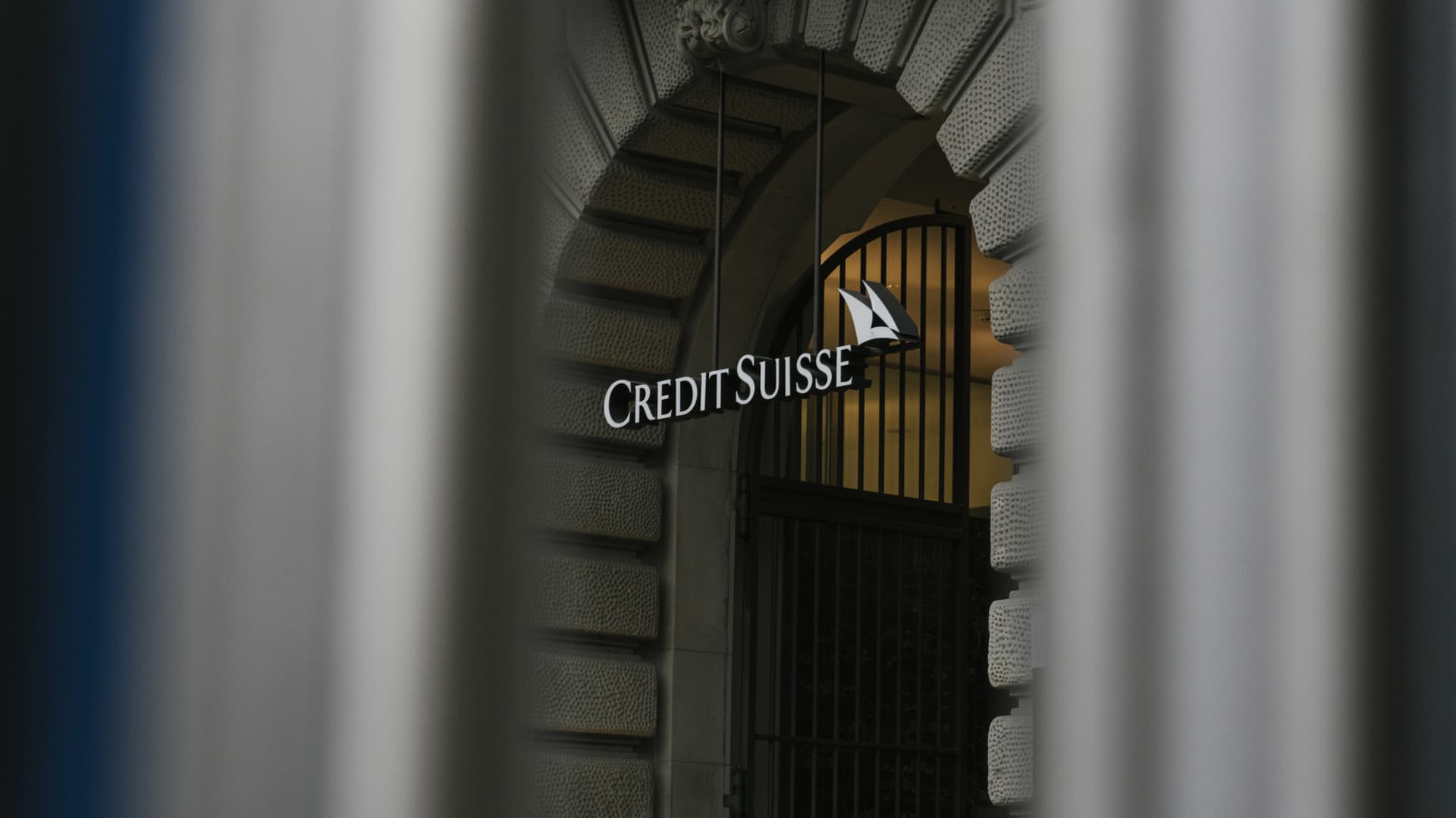A sign above the entrance to the Credit Suisse Group AG headquarters in Zurich, Switzerland, on Monday, Nov. 1, 2021.