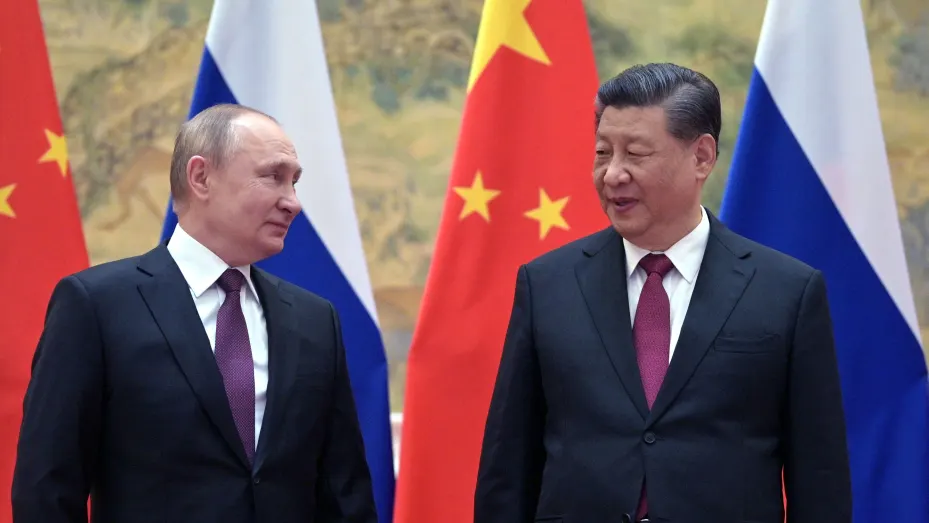Russian President Vladimir Putin and Chinese President Xi Jinping pose for a photograph during their meeting in Beijing, on Feb. 4, 2022. The two countries announced a 