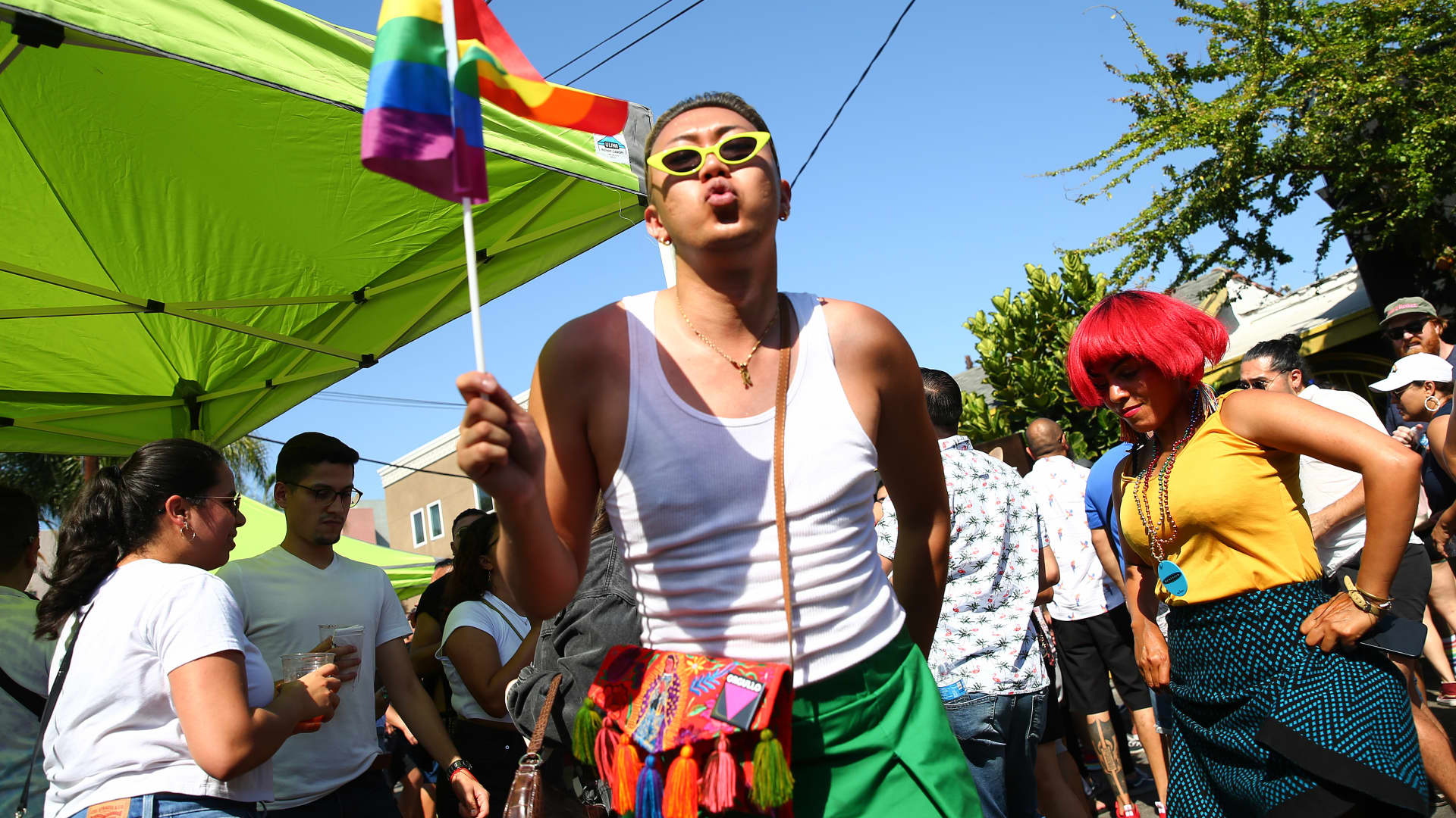 People dance at the Orgullo Fest (Pride Fest) in the predominantly Latino neighborhood of Boyle Heights on June 27, 2021 in Los Angeles, California.