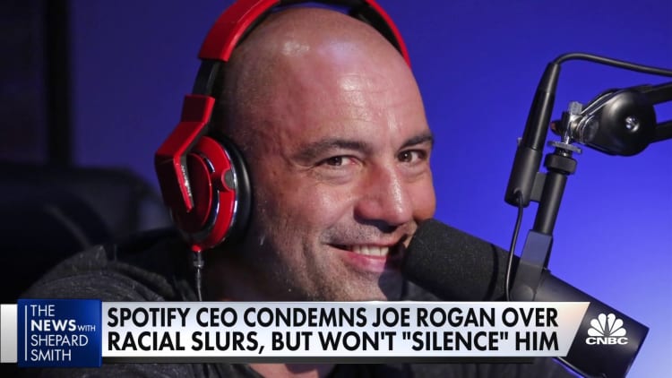 Spotify's CEO condemns Rogan over racial slurs, but says he won't silence podcaster