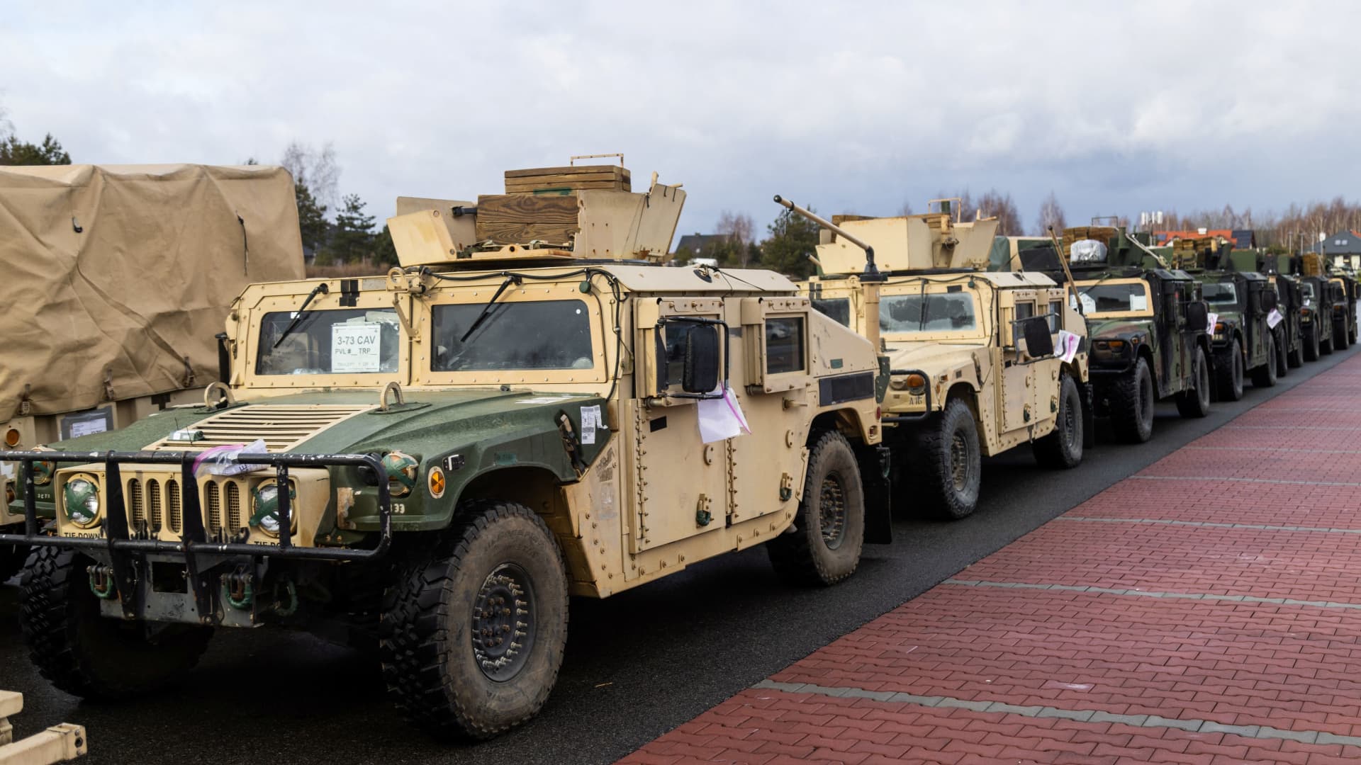U.S. military vehicles are parked outside the G2A Arena near the Rzeszow-Jasionka Airport, Poland February 7, 2022.