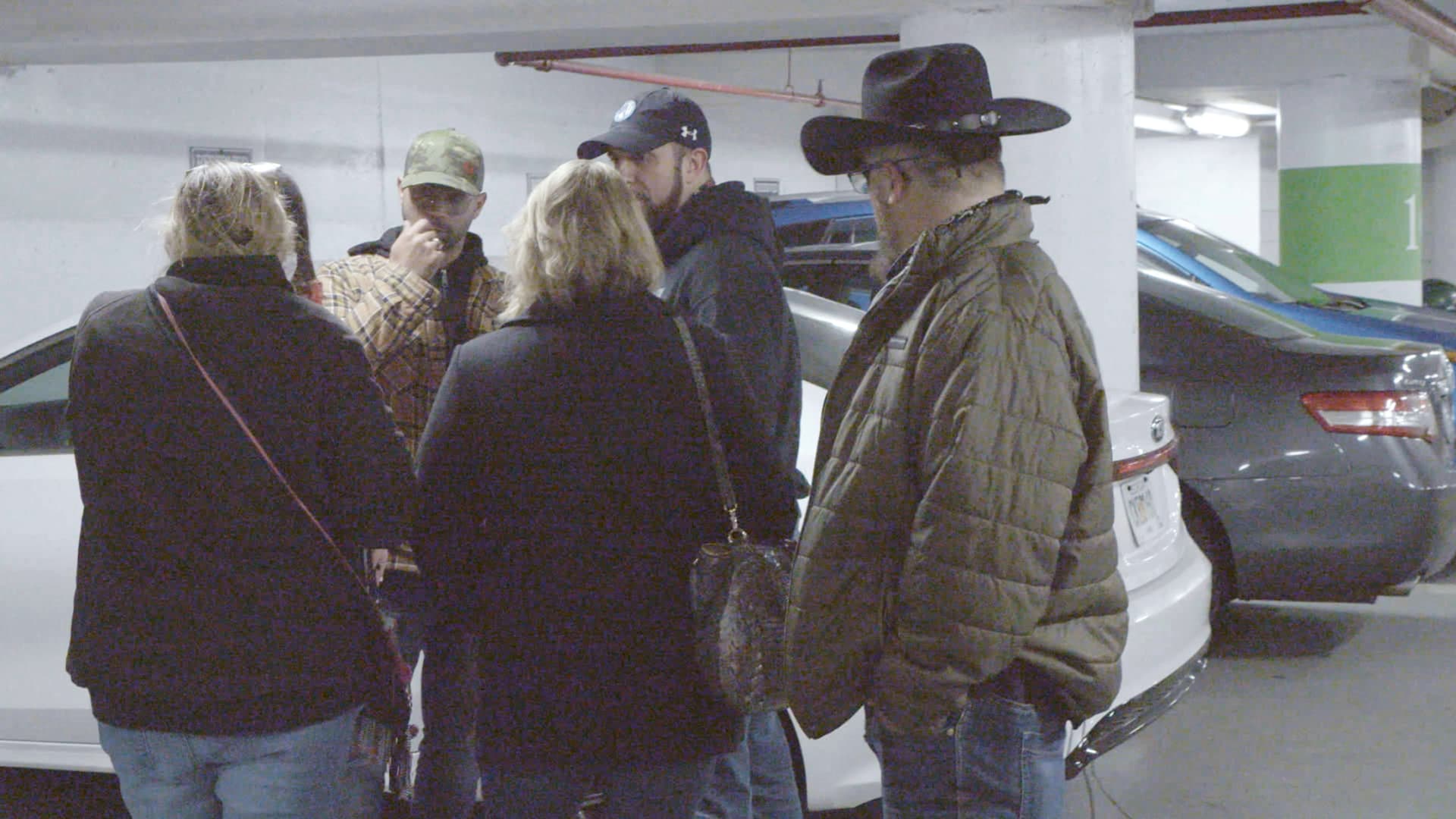 Enrique Tarrio, Chairman of the Proud Boys, and Stewart Rhodes, founder of the Oath Keepers, attend a meeting in a garage in Washington, U.S. in a still image taken from video January 5, 2021, the day before the January 6 riot.
