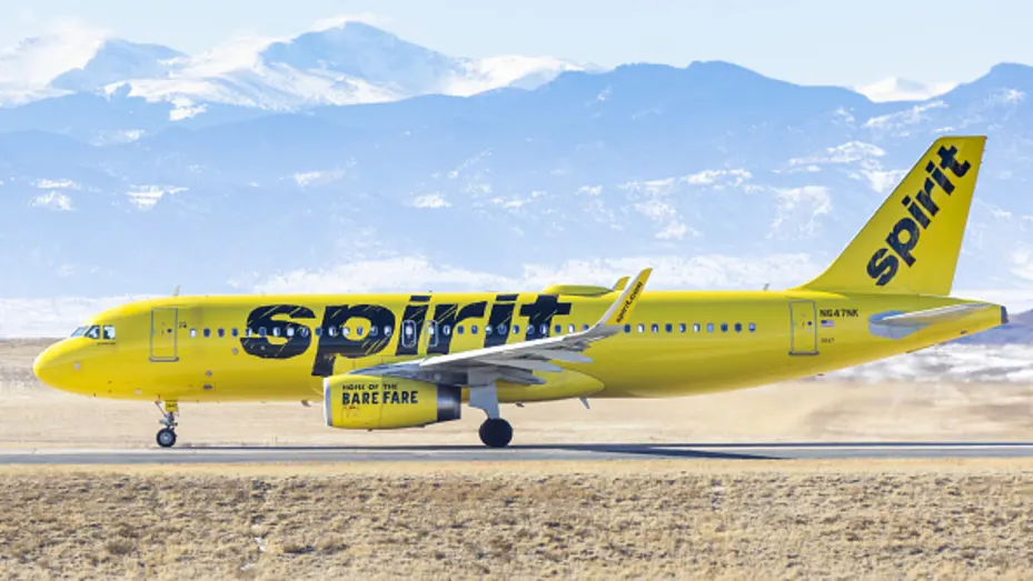 A Spirit Airlines airplane taxis for takeoff at Denver International Airport in Denver, Colorado, U.S., on Monday, Feb. 7, 2022.