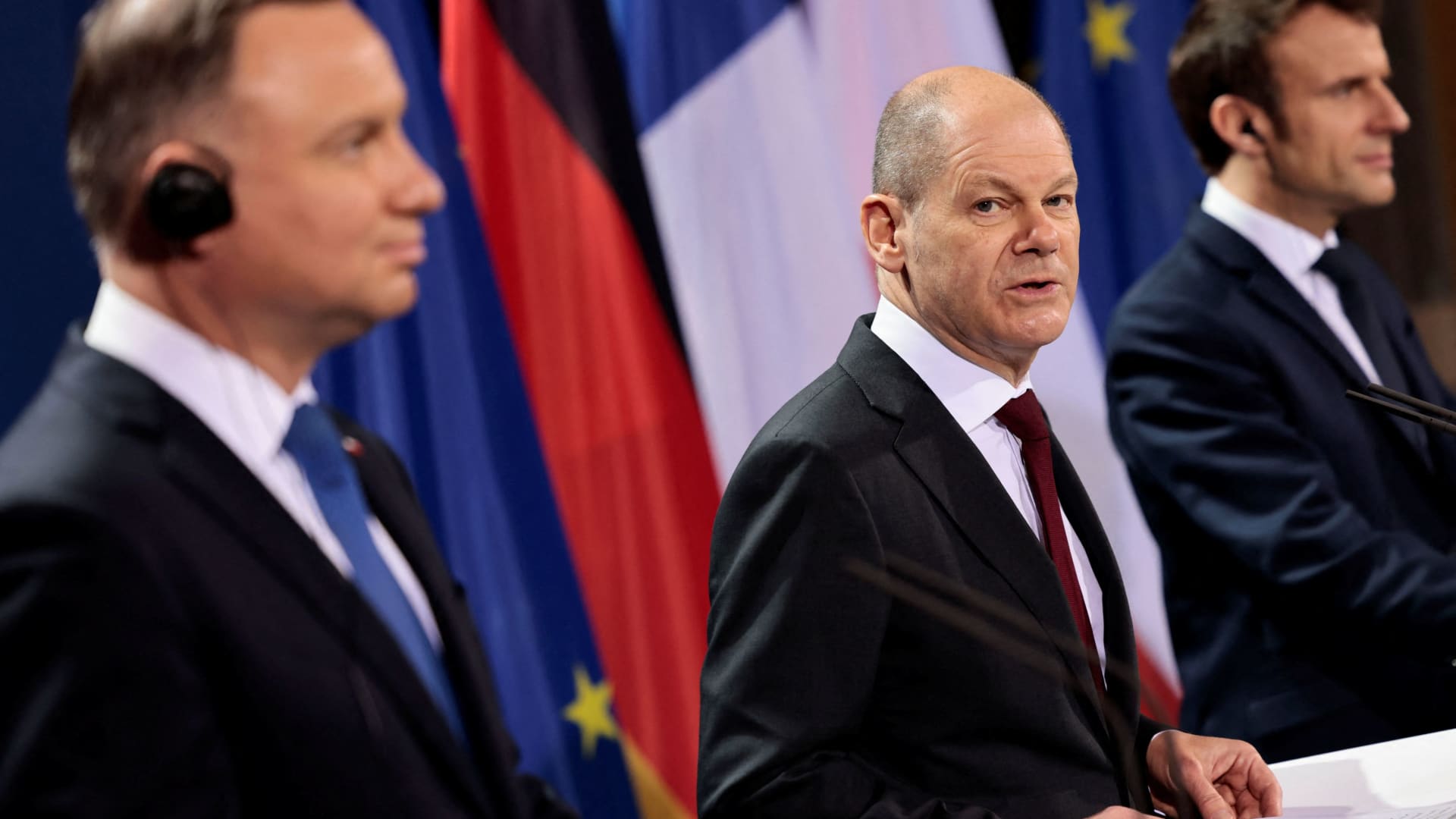 German Chancellor Olaf Scholz, French President Emmanuel Macron and Polish President Andrzej Duda attend a news conference ahead of a Weimar Triangle meeting to discuss the ongoing Ukraine crisis, in Berlin, Germany, February 8, 2022.