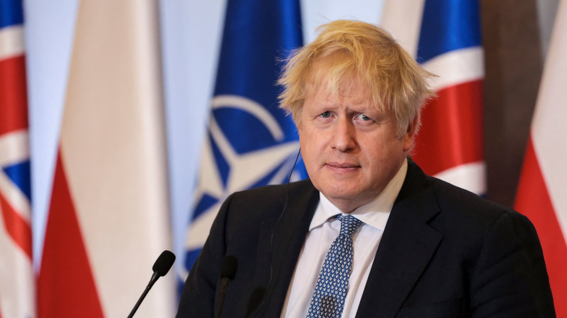 Britain's Prime Minister Boris Johnson attends a joint news conference with Polish Prime Minister Mateusz Morawiecki (not pictured) in Warsaw, Poland February 10, 2022.
