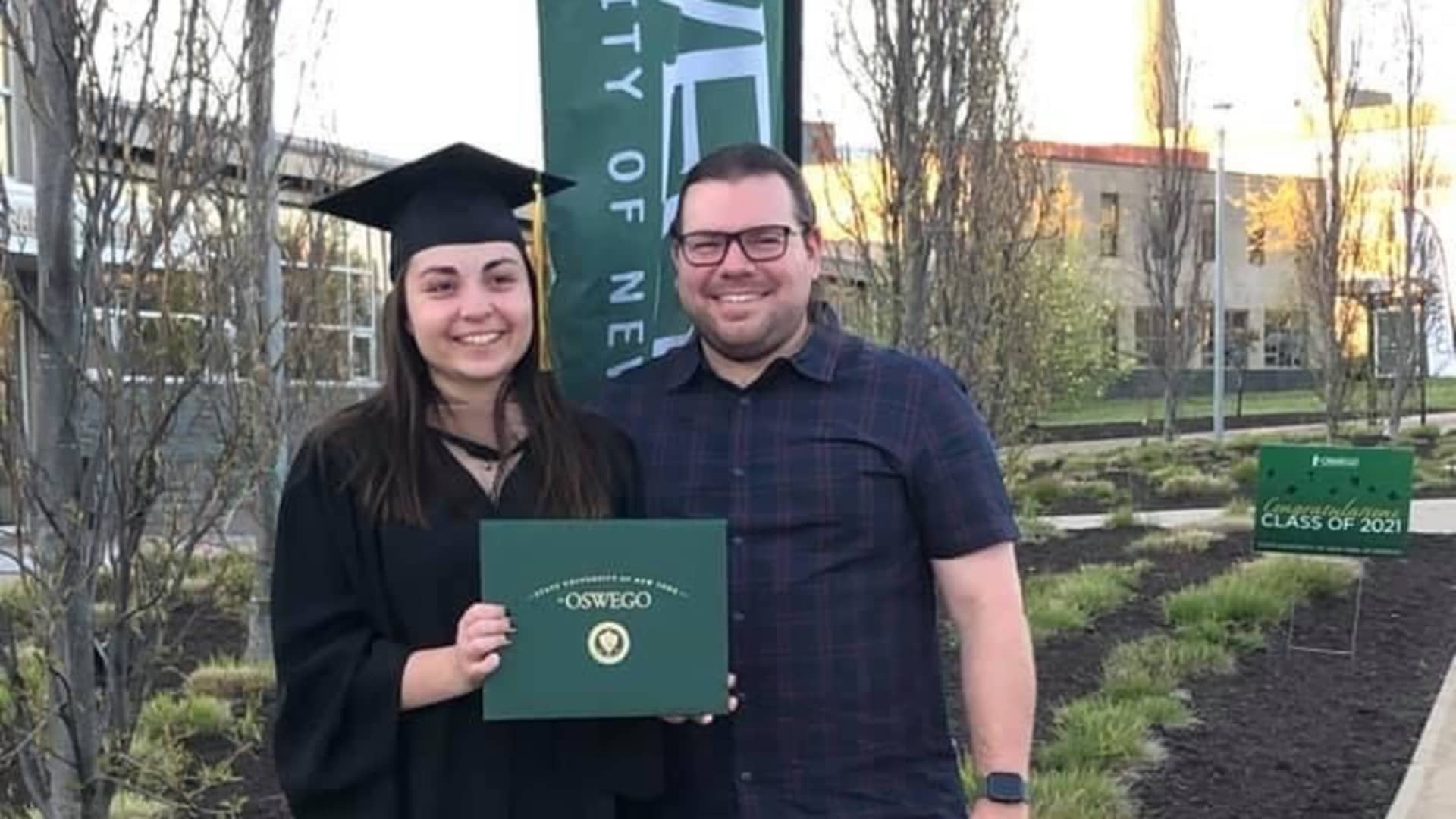 Kelsey DiCarlo and Michael Mancuso celebrate her graduation from business school.