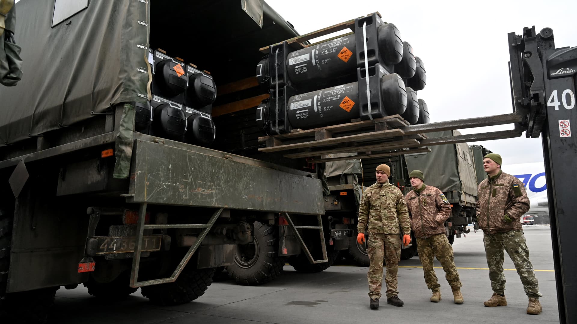 Ukraine was already stocking up on U.S.-made Javelins before Russia invaded. Here a group of Ukrainian servicemen take a shipment of Javelins in early February, as Russia positioned troops on Ukraine's border.