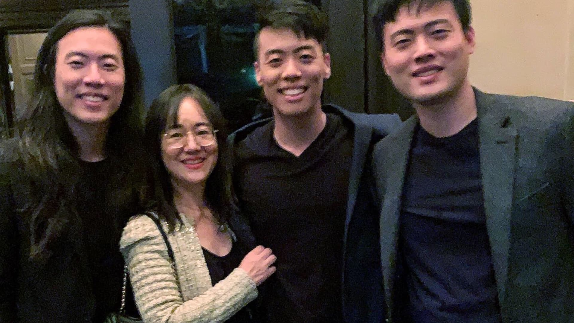 Dennis Kim (second from right) with his mother and brothers at a performance at the Nomad Hotel.