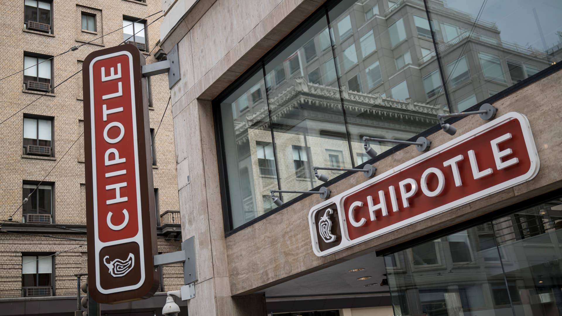 Stocks making the biggest moves midday: Chipotle, Microsoft, Spotify, Alphabet a..