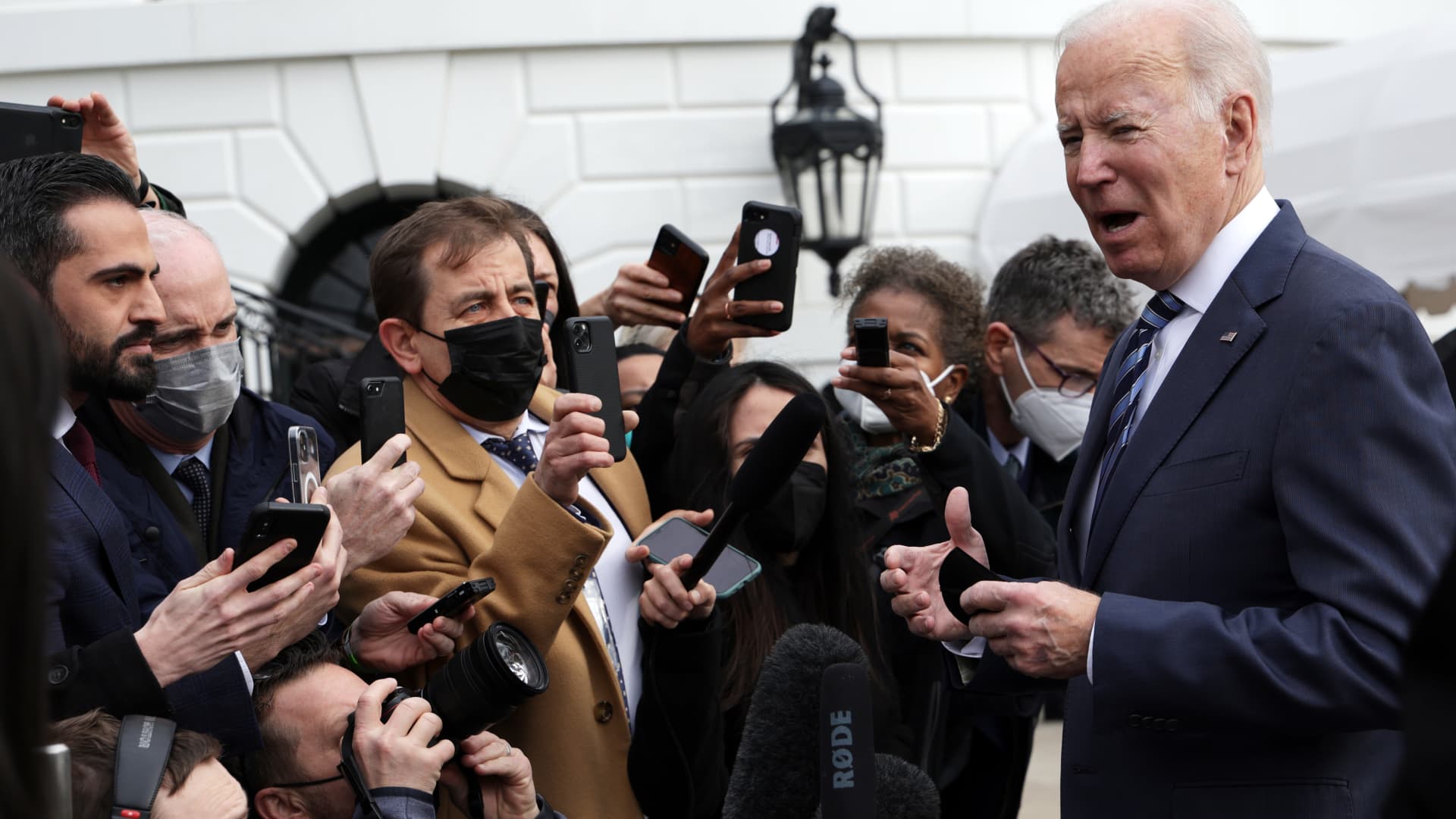 U.S. President Joe Biden speaks to members of the press prior to a departure for Cleveland, Ohio from the White House on February 17, 2022 in Washington, DC.