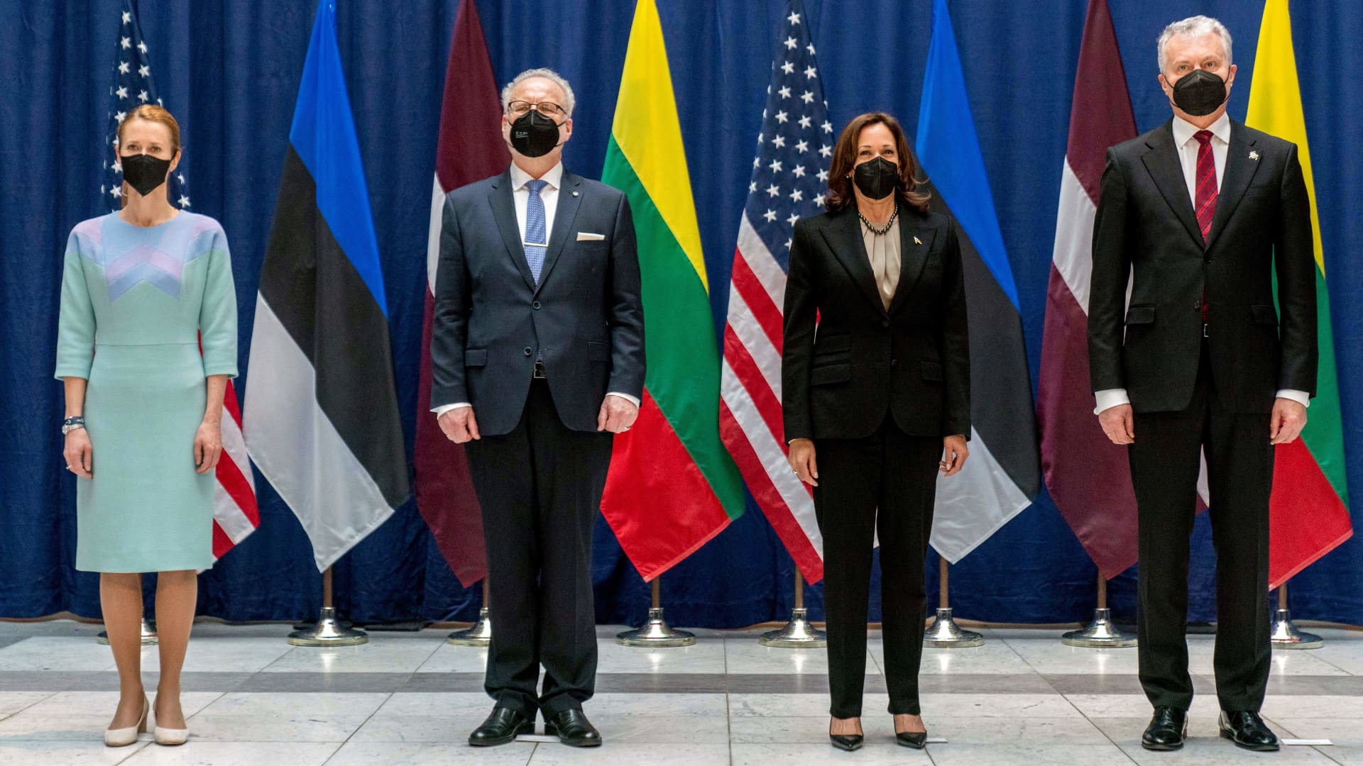 (LtoR) Estonian Prime Minister Kaja Kallas, Latvian President Egils Levits, US Vice President Kamala Harris and Lithuanian President Gitanas Nauseda pose for photographs on the sidelines of a multilateral meeting during the Munich Security Conference (MSC) in Munich, southern Germany, on February 18, 2022.