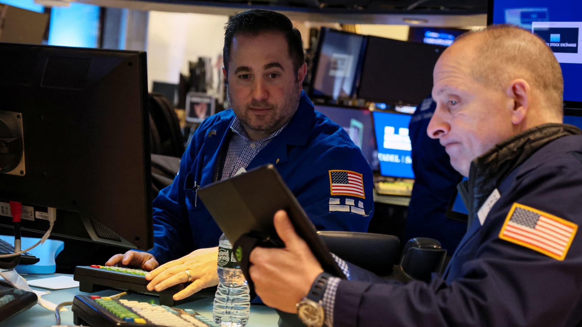 Traders work on the floor of the New York Stock Exchange (NYSE) in New York City, U.S., February 18, 2022.