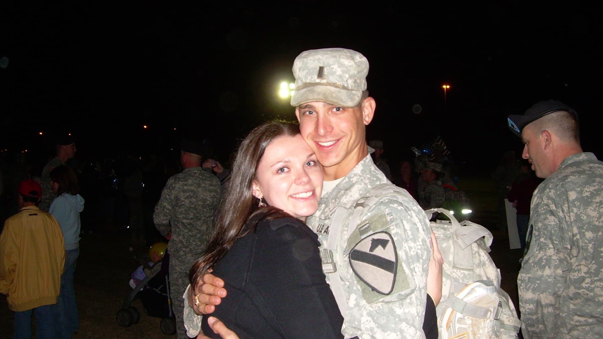 Russell Toll and his wife, Heidi, when he returned from service in Iraq in 2009.
