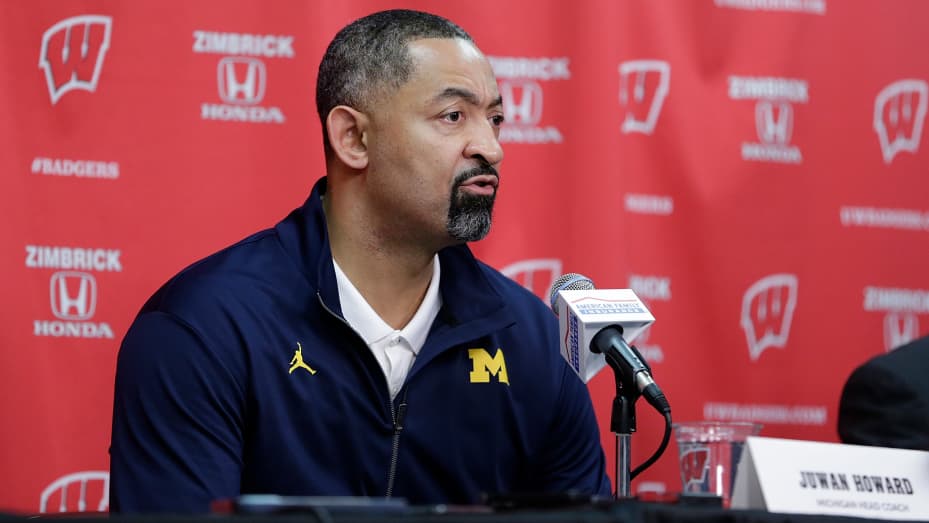 Michigan's Juwan Howard suspended, fined after hitting Wisconsin
