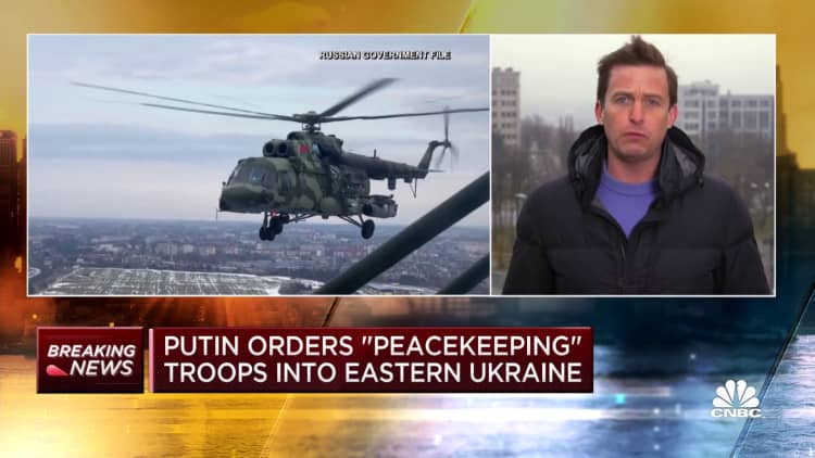 Putin orders 'peacekeeping' troops into Eastern Ukraine