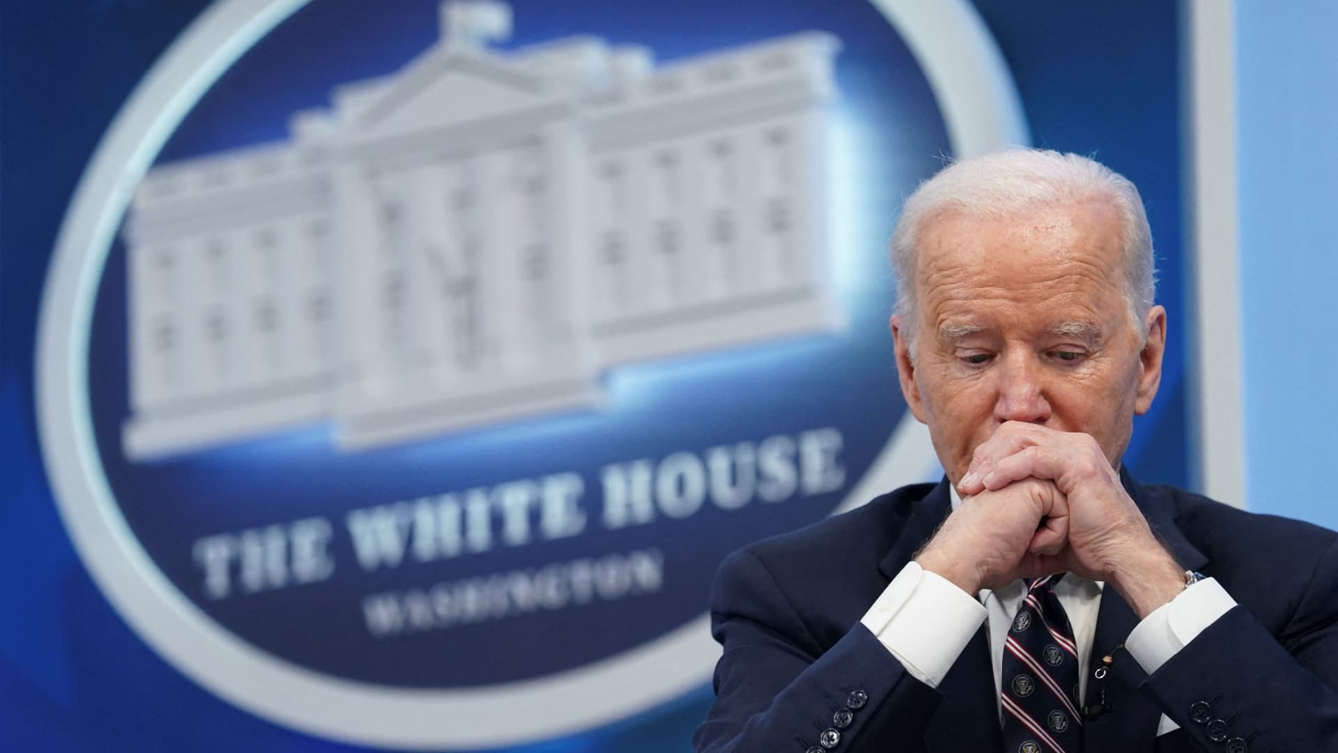 U.S. President Joe Biden looks down while hosting a virtual roundtable on securing critical minerals at the White House in Washington, February 22, 2022.