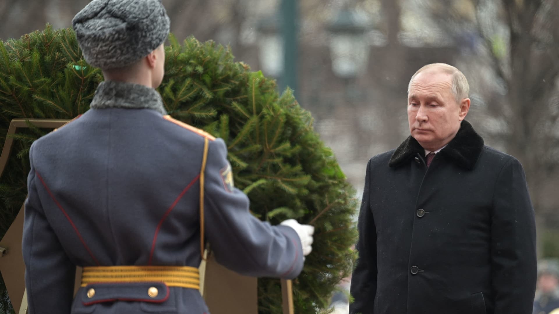 Russian President Vladimir Putin takes part in a wreath laying ceremony at the Tomb of the Unknown Soldier by the Kremlin Wall on the Defender of the Fatherland Day in Moscow, Russia February 23, 2022.